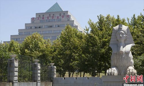 A replica of Egypt��s Sphinx stands in front of the campus library intended to resemble an Egyptian pyramid at Wuhan International Trade University. Photo: chinanews.com