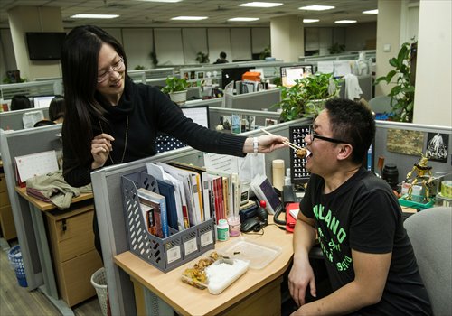 While flirtation can be a useful tool in the workplace, it is important not to cross professional boundaries. (Photo: GT/Li Hao)