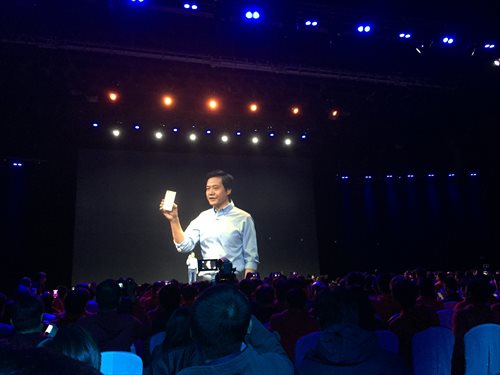 Lei Jun, founder of Xiaomi, shows a new model at a news conference held in Beijing on Wednesday. (Photo: Zhang Ye/GT)