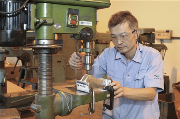 Hu Shuangqian at work.��Photo provided to China Daily��