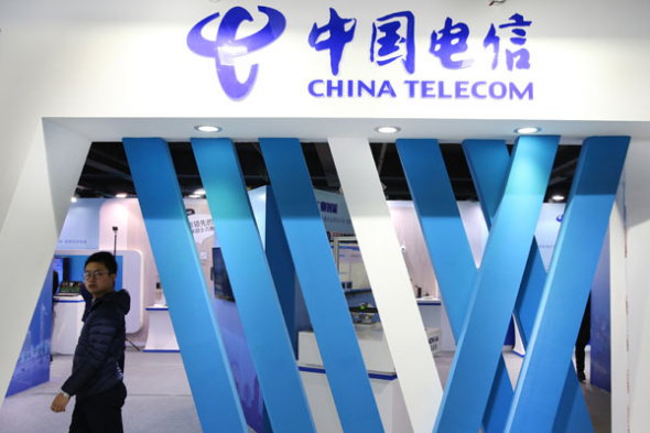 The booth of China Telecommunications Corp is seen at an industry expo in Nantong, East China��s Jiangsu province. (Photo by Xu Congjun/For China Daily)
