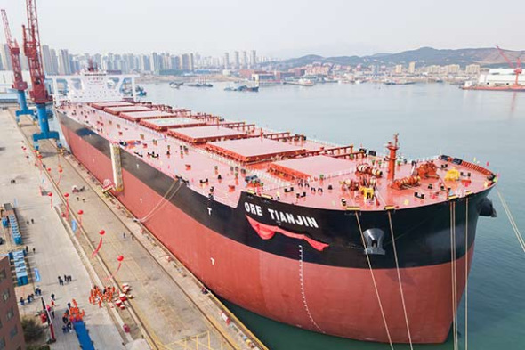 Qingdao Beihai Shipbuilding Heavy Industry Co, a subsidiary of Wuchang Shipbuilding Industry Group Co Ltd, delivered Ore Tianjin��a very large ore carrier��to its client on Thursday.(Photo by Zhang Jingang/for China Daily)