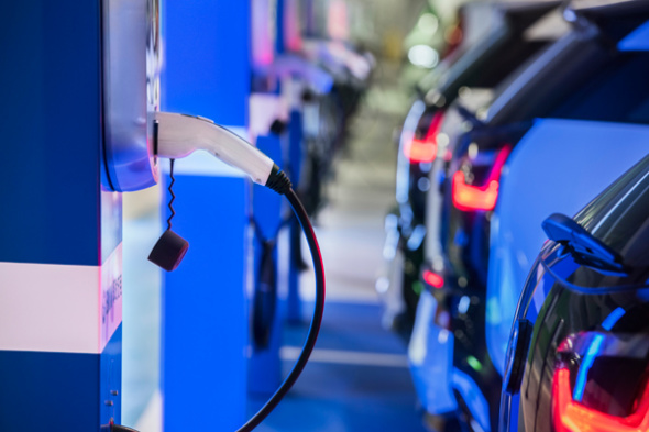 BMW models charge up at public poles installed by the German automaker across the country. (Photo provided to China Daily)