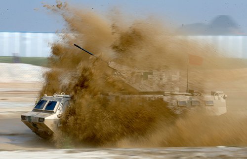 China North Industries Group Corporation demonstrates the CS/VN9 6x6 Wheeled Armored Vehicle on Thursday at the Airshow China 2016, in Zhuhai, South China's Guangdong Province. (Photo/GT)